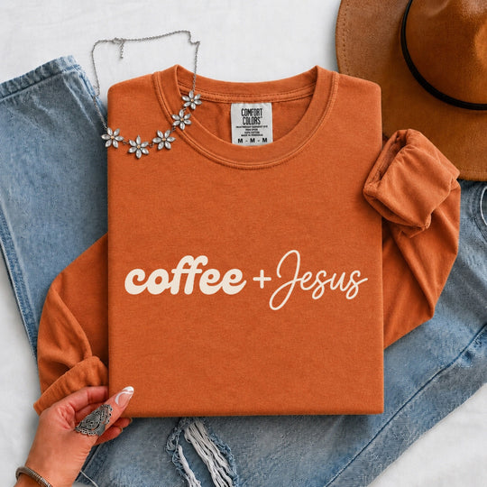 May include a Coffee + Jesus Comfort Colors Long Sleeve Shirt featuring a simple Christian faith and coffee-inspired statement design.