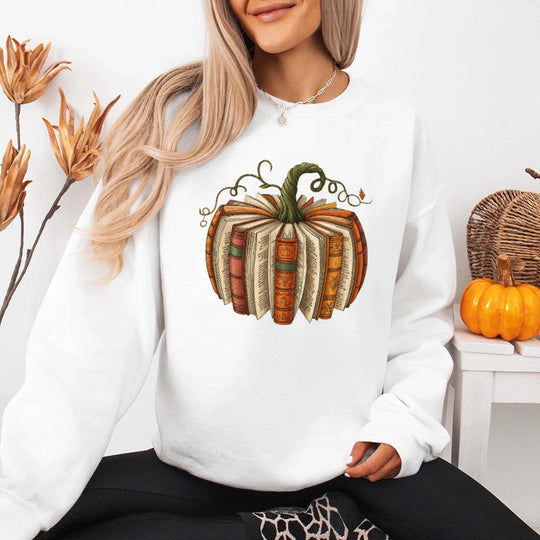 May include Fall Book Pumpkin sweatshirt with cozy book and pumpkin graphic, classic unisex crewneck, and soft fleece fabric