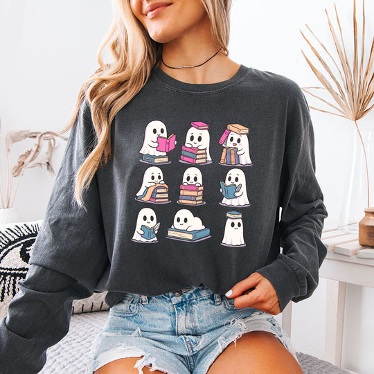 May include Ghost Reading Comfort Colors Halloween long sleeve shirt with ghost reading a book graphic, garment-dyed cotton, and relaxed unisex fit