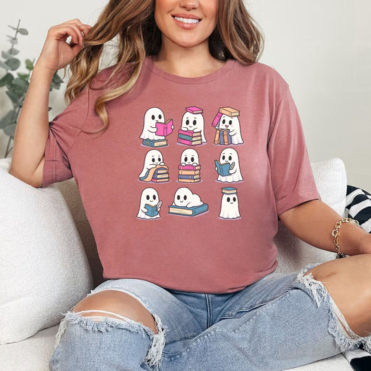 May include Ghost Reading Halloween shirt with cute ghost reading a book graphic, classic unisex fit, and soft cotton fabric
