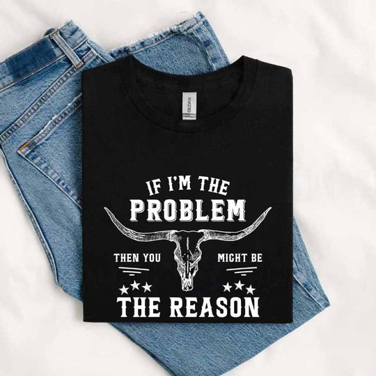 May include a folded black sarcastic graphic t-shirt reading “If I'm the Problem, Then You Might Be the Reason”.
