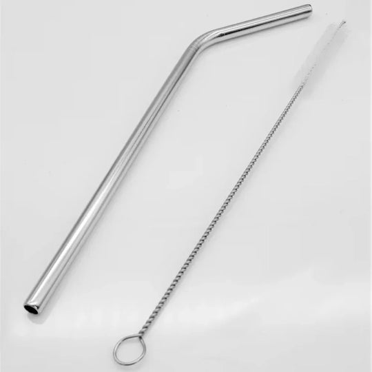 Reusable metal straw with angled tip and cleaning brush on white background