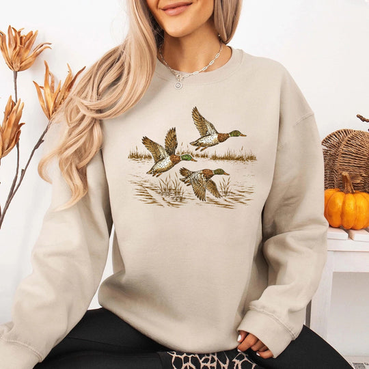 May include Wild Mallard Ducks sweatshirt with mallard duck graphic, classic unisex crewneck, long sleeves, and soft fleece fabric