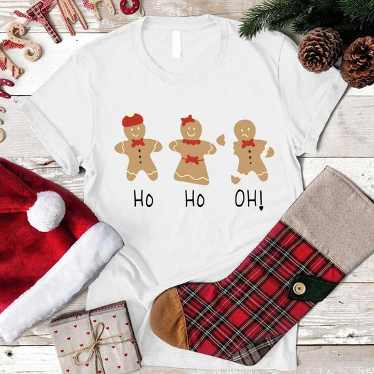 May include a festive unisex Christmas t-shirt with gingerbread cookie graphics, designed for cozy holiday wear and seasonal cheer.