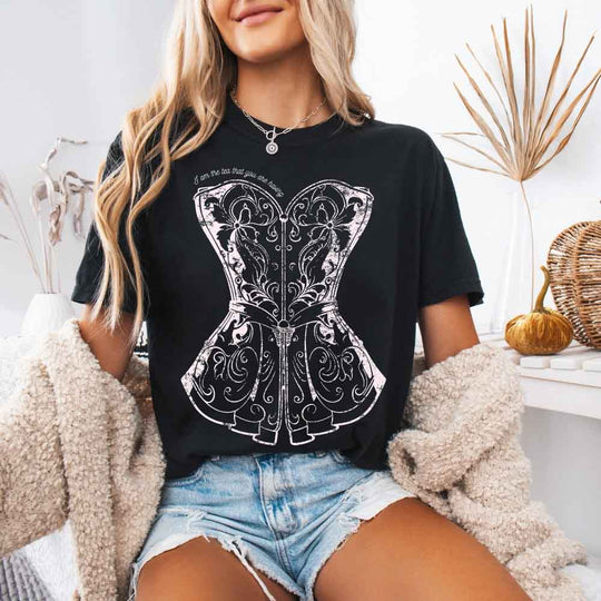 May include a person wearing a Black I Am The Tea That You Are Having Comfort Colors T-Shirt featuring royal court inspired graphic and relaxed fit.