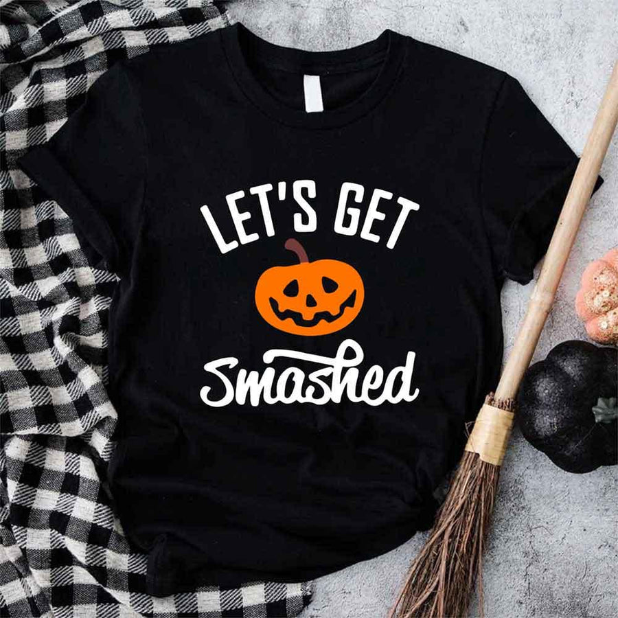May include matching couple Halloween shirts with bold text, one reading ‘Let’s Get Smashed’ with jack-o’-lantern graphic on white tee, and the other reading ‘Let’s Get Sheet Faced’ with ghost graphic on black tee – funny spooky couple apparel.