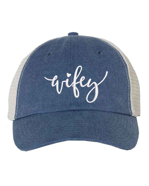 May include an embroidered pigment-dyed trucker hat with mesh back, featuring “Wifey” or “Hubby” text, designed as a casual and stylish gift for spouses or anniversaries.