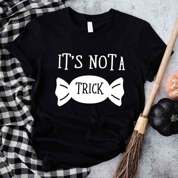 May include matching couple Halloween pregnancy announcement shirts, one reading ‘We’re Expecting a Little Treat’ with candy and baby footprints, and the other reading ‘It’s Not Trick’ with candy graphic – fun maternity reveal apparel.
