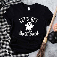 May include matching couple Halloween shirts with bold text, one reading ‘Let’s Get Smashed’ with jack-o’-lantern graphic on white tee, and the other reading ‘Let’s Get Sheet Faced’ with ghost graphic on black tee – funny spooky couple apparel.