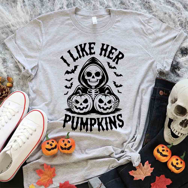 May include matching couple Halloween shirts, one with skeleton and pumpkins graphic reading ‘I Like Her Pumpkins,’ and the other with skeleton witch flying on broom reading ‘I Like His Broomstick’ – funny spooky couple tees.