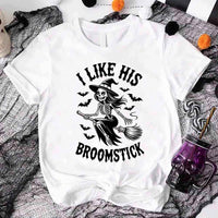 White t-shirt with skeleton design and text 'I Like His Broomstick' on a Halloween-themed background.