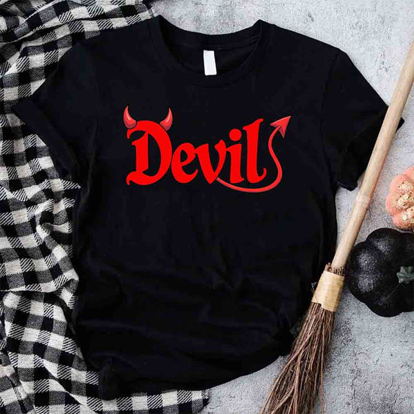 May include matching couple Halloween shirts, one with text ‘I Put the D in Devil’ in white with pitchfork graphic, and the other with bold red ‘Devil’ text featuring horns and tail – funny spooky couple tees.