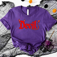 Purple t-shirt with 'Devil' in red on a Halloween-themed background
