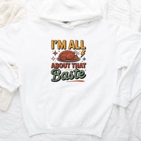 White hoodie with a graphic design and text on a white background