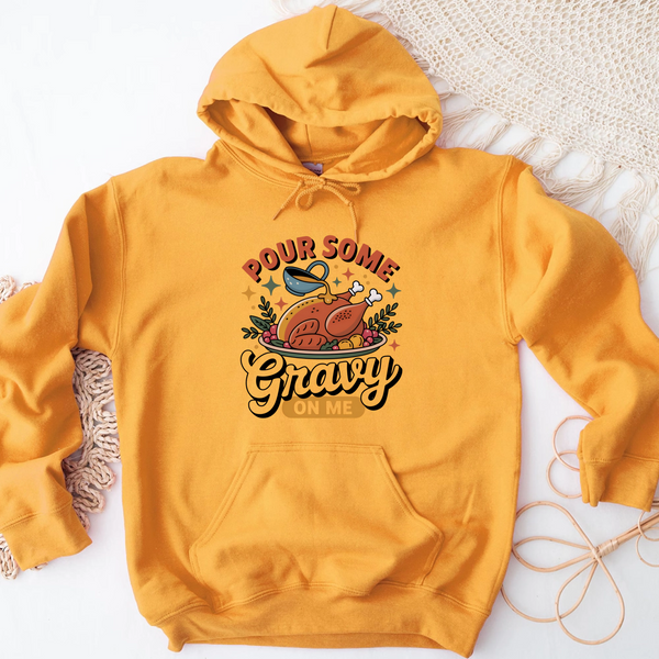 Yellow hoodie with a graphic design and text on a white background