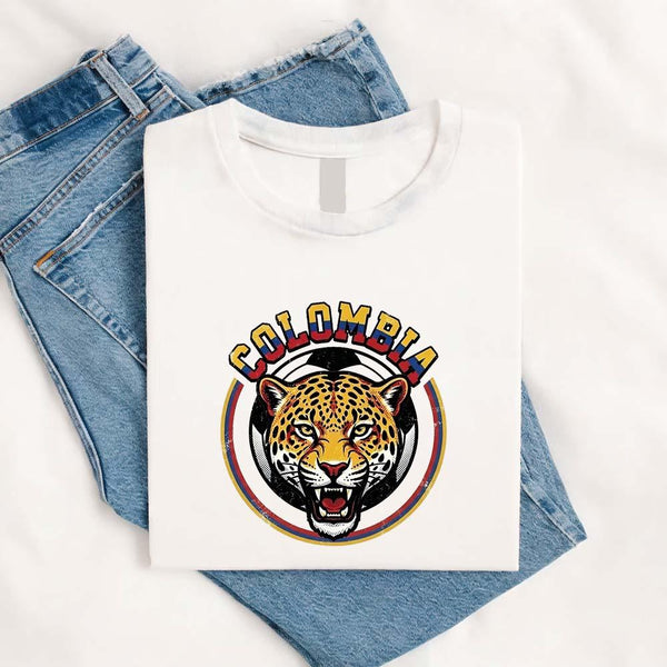 May include a person wearing a White Colombia  2026 World Cup Countries Animal Emblems T-Shirt featuring bold animal graphic and relaxed fit.