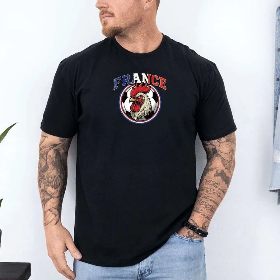 Man wearing black France soccer fan t-shirt with rooster and soccer ball graphic.