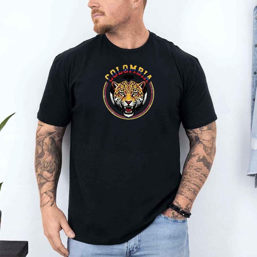 Man wearing black Colombia soccer fan t-shirt with jaguar emblem and bold graphic design