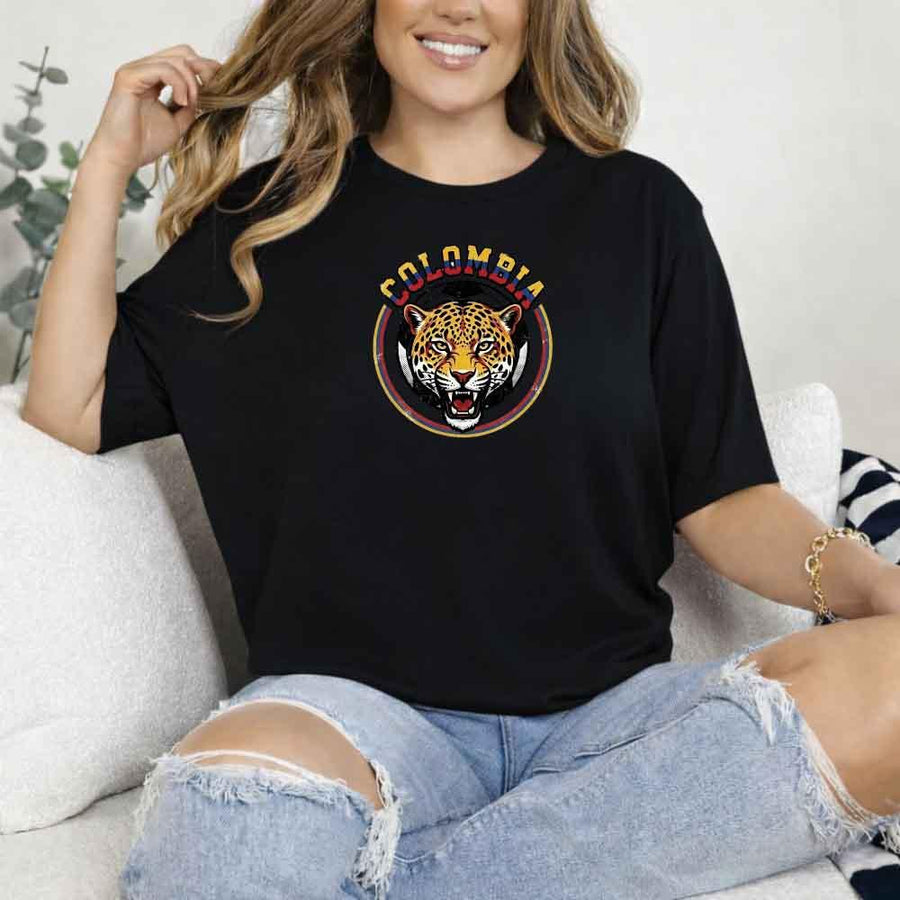 Woman wearing black Colombia jaguar graphic T-shirt, soccer fan apparel, casual style