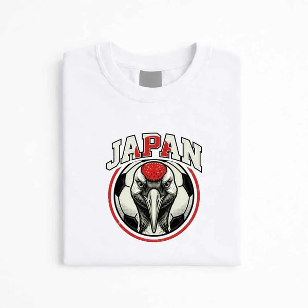 Japan soccer graphic tee with crane and soccer ball design on white shirt