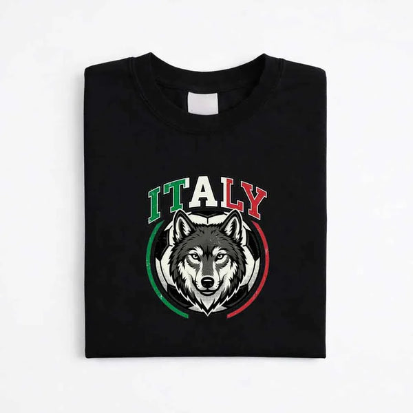 Black Italy soccer T-shirt with wolf graphic and tricolor design, folded on white background