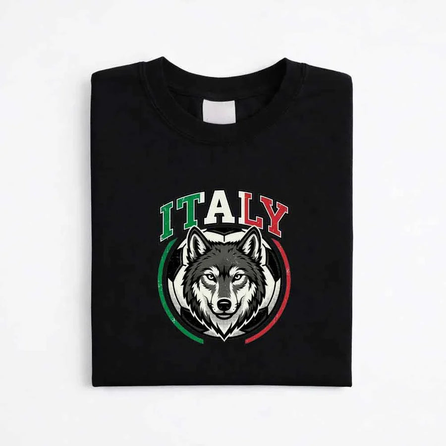 Black Italy soccer T-shirt with wolf graphic and tricolor design, folded on white background