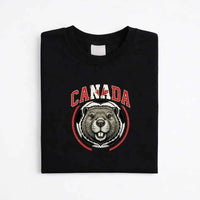May include a person wearing a Black Canada 2026 World Cup Countries Animal Emblems T-Shirt featuring bold animal graphic and relaxed fit.