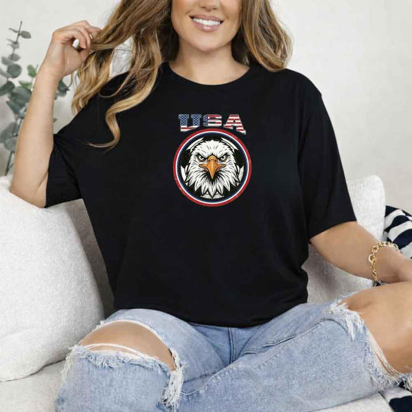 Woman wearing black USA bald eagle graphic soccer fan t-shirt, casual style