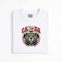 May include a person wearing a White Canada 2026 World Cup Countries Animal Emblems T-Shirt featuring bold animal graphic and relaxed fit.