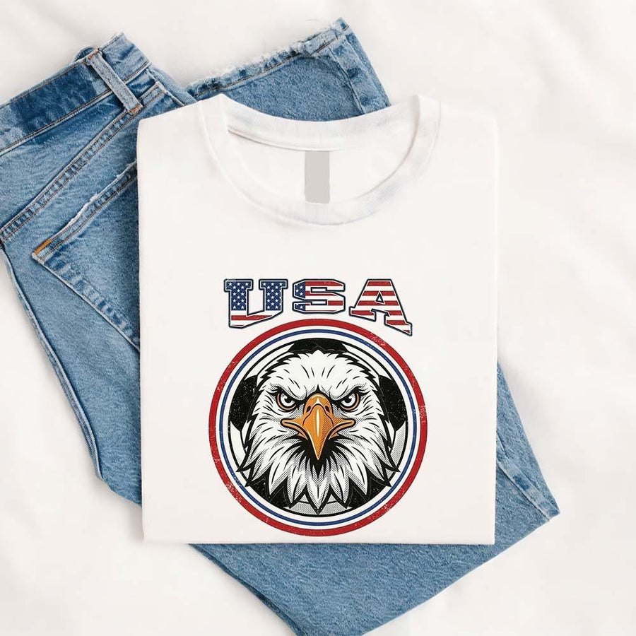 May include a person wearing a White USA 2026 World Cup Countries Animal Emblems T-Shirt featuring bold animal graphic and relaxed fit.