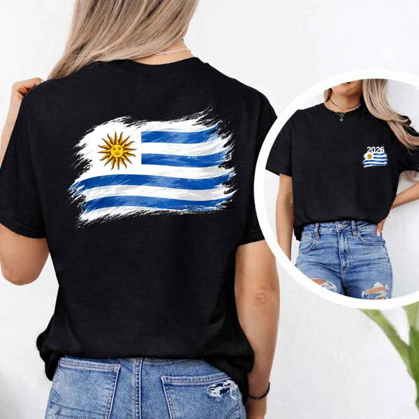 May include a person wearing a Black Uruguay 2026 World Cup "Countries" T-Shirt – Soccer Fan Graphic Tee featuring bold soccer countries graphic and relaxed fit.