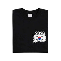 May include a person wearing a Black South Korea 2026 World Cup "Countries" T-Shirt – Soccer Fan Graphic Tee featuring bold soccer countries graphic and relaxed fit.