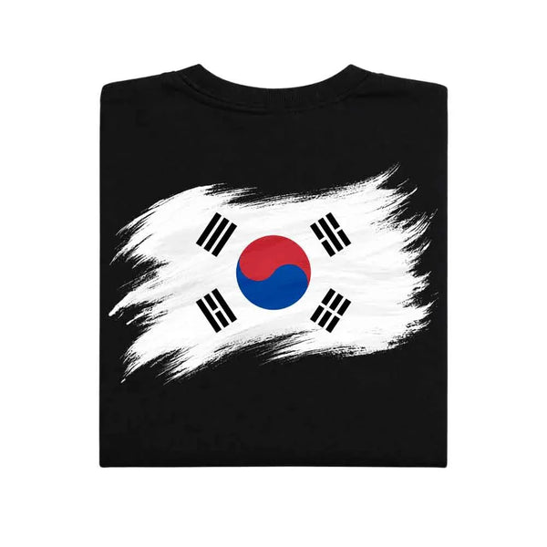 May include a person wearing a Black  South Korea 2026 World Cup "Countries" T-Shirt – Soccer Fan Graphic Tee featuring bold soccer countries graphic and relaxed fit.