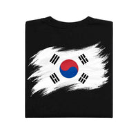 May include a person wearing a Black  South Korea 2026 World Cup "Countries" T-Shirt – Soccer Fan Graphic Tee featuring bold soccer countries graphic and relaxed fit.