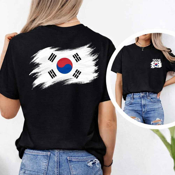 May include a person wearing a Black South Korea 2026 World Cup "Countries" T-Shirt – Soccer Fan Graphic Tee featuring bold soccer countries graphic and relaxed fit.