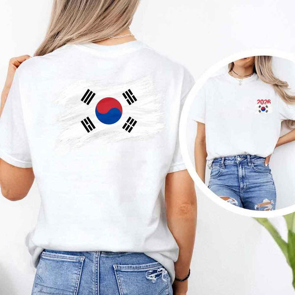 May include a person wearing a White South Korea 2026 World Cup "Countries" T-Shirt – Soccer Fan Graphic Tee featuring bold soccer countries graphic and relaxed fit.