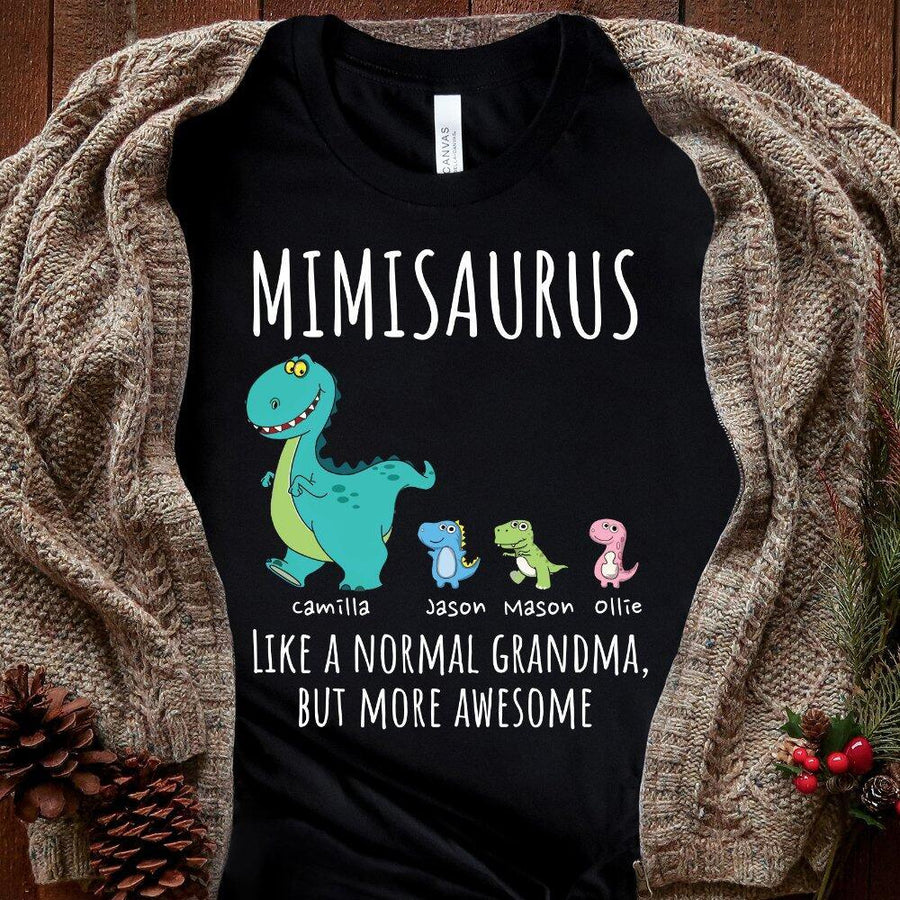 Black t-shirt with a colorful dinosaur design and text 'MIMISARUS like a normal grandma, but more awesome' along with three names: Camilla, Jason, and Mike. 
