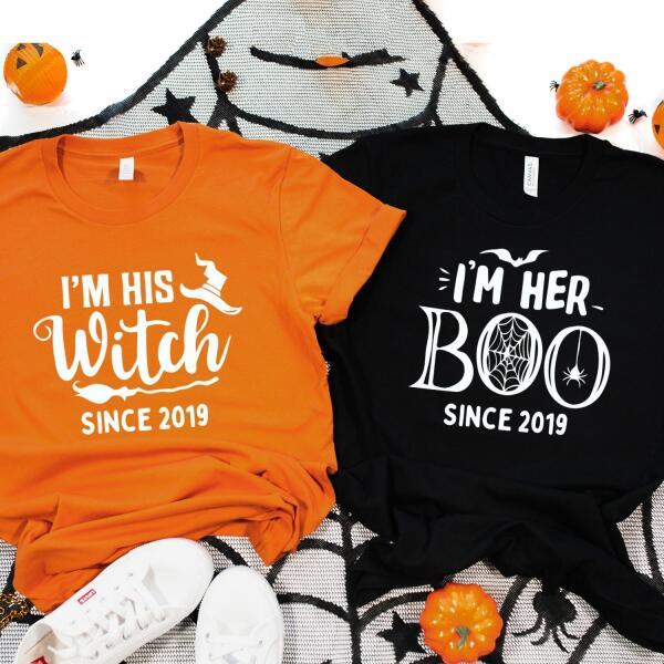 Two Halloween couple t-shirts, one orange and one black