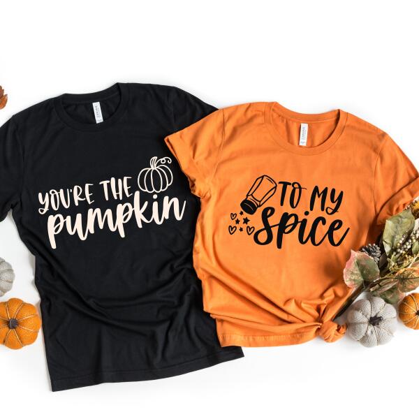 Black and orange t-shirts with Halloween-themed text on a white background.