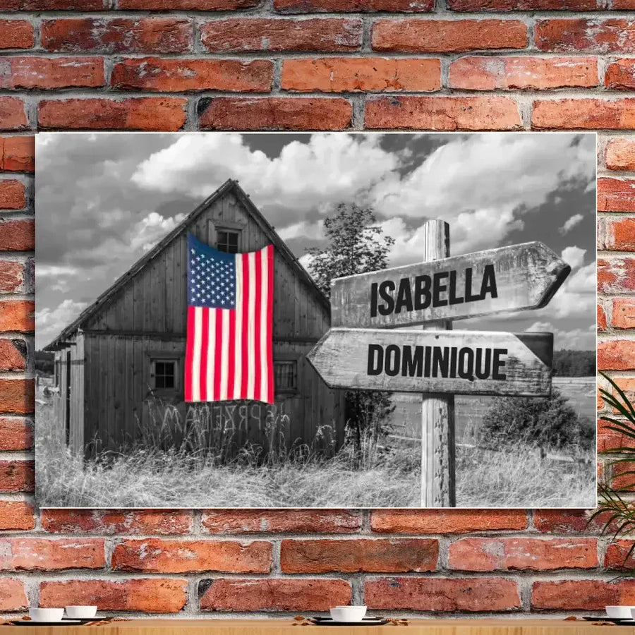 Custom wall art showing an American flag on a barn, with rustic signposts reading Isabella and Dominique.