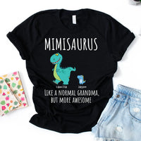Black t-shirt with a colorful dinosaur design and text 'MIMISARUS like a normal grandma, but more awesome' along with three names: Camilla, Jason, and Mike. 