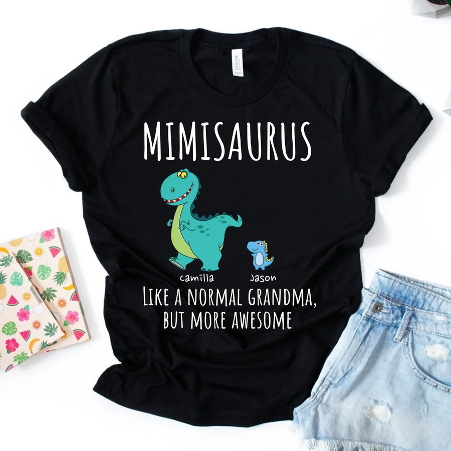 Black t-shirt with a colorful dinosaur design and text 'MIMISARUS like a normal grandma, but more awesome' along with three names: Camilla, Jason, and Mike. 