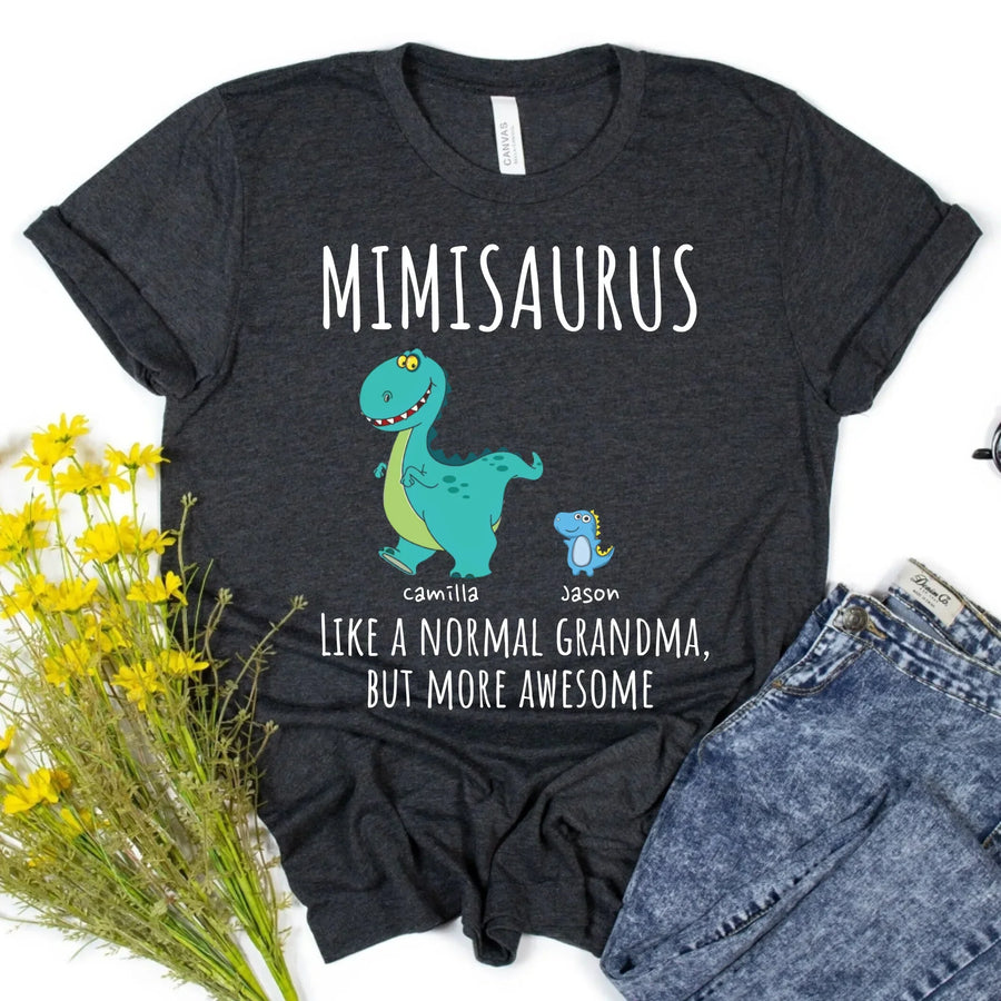 Black t-shirt with a colorful dinosaur design and text 'MIMISARUS Like a normal grandma, but more awesome' along with personalized names 'Camilla, Jason, Mason, Ellie'. 