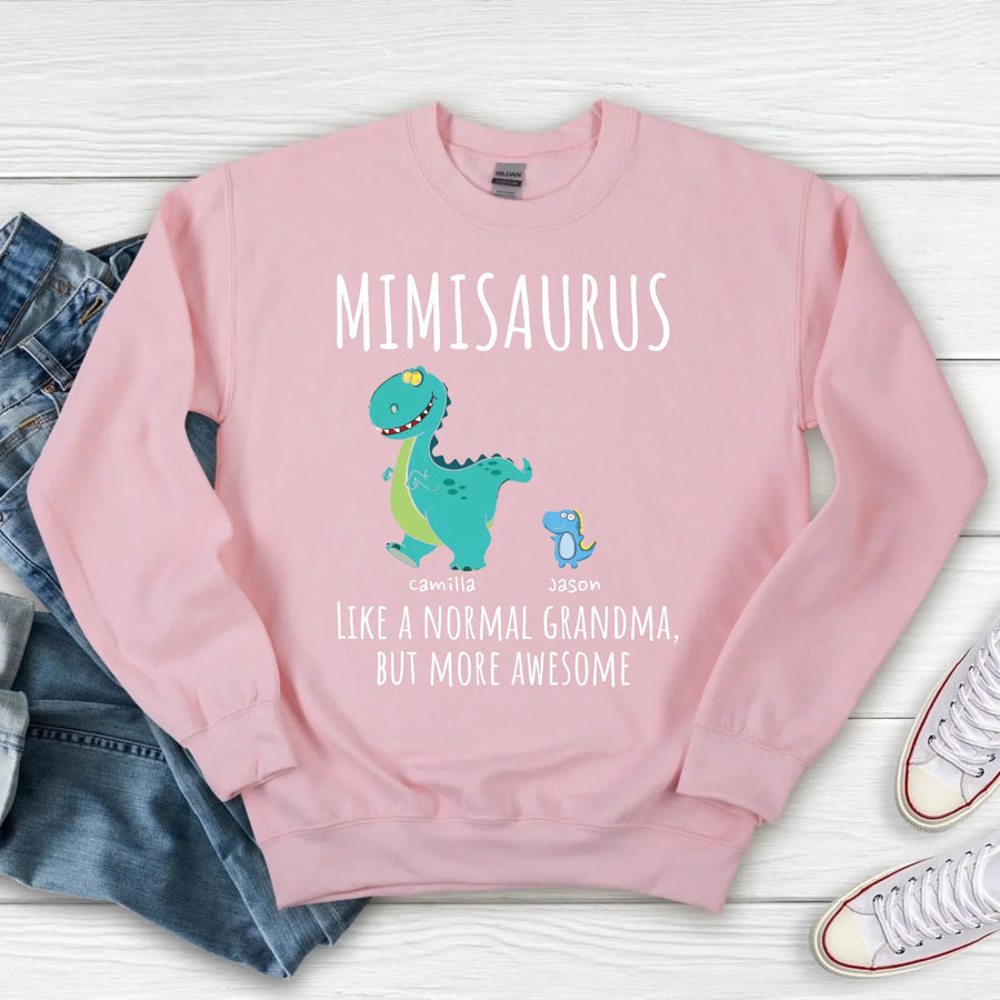 Black t-shirt with a colorful dinosaur design and text 'MIMISARUS like a normal grandma, but more awesome' along with three names: Camilla, Jason, and Mike. 