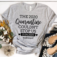 Gray custom tee with 'The 2020 Quarantine Couldn't Stop Us' text, date, and #justmarried, styled with accessories.