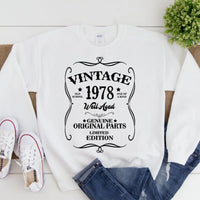 May include a personalized vintage-style birthday T-shirt with the words Well Aged and a custom year printed on the front.