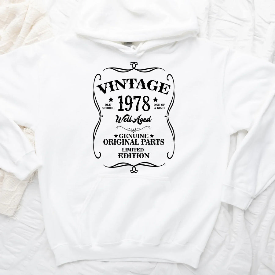 May include a personalized vintage-style birthday T-shirt with the words Well Aged and a custom year printed on the front.