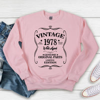 May include a personalized vintage-style birthday T-shirt with the words Well Aged and a custom year printed on the front.
