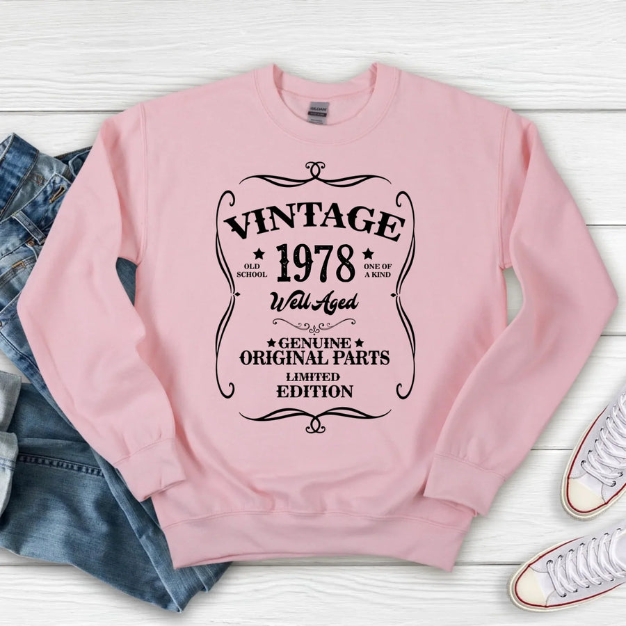 May include a personalized vintage-style birthday T-shirt with the words Well Aged and a custom year printed on the front.