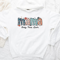 White hoodie with 'mama' and names printed on it, laid flat.